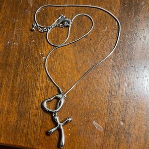 Interlocking heart and cross silver necklace